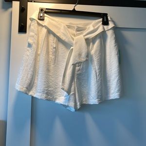 Women’s CeCe shorts - Sz 10 - belted with pleats and pockets. Zipper in front.